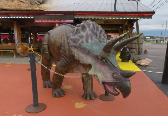 small triceratops statue outside an arcade or restaurant, I forget which.